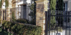 Brick wall fence piers