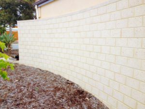 freestanding limestone block wall
