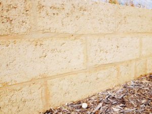 reconstituted limestone block wall
