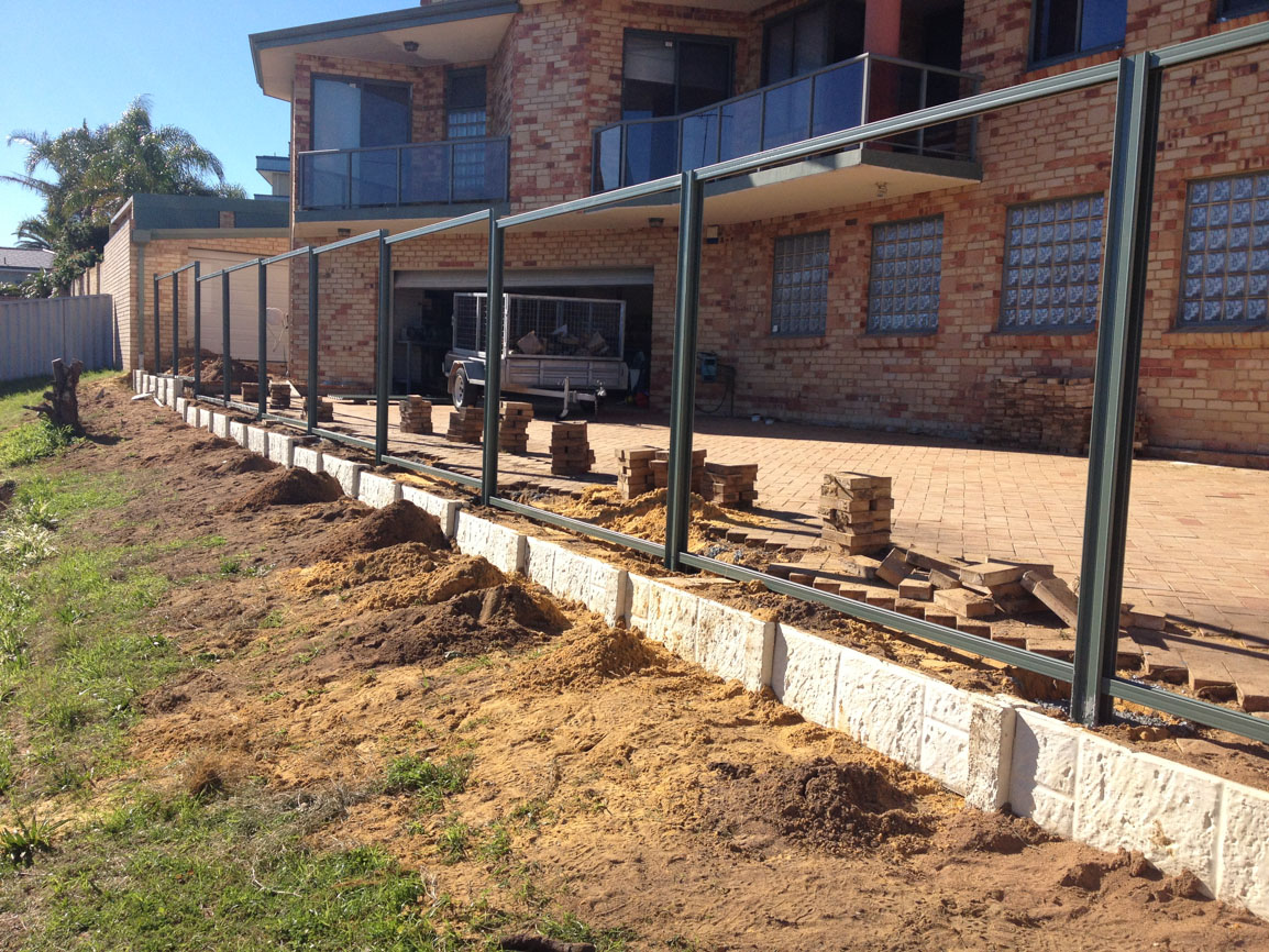 panel and post retaining with colorbond fence