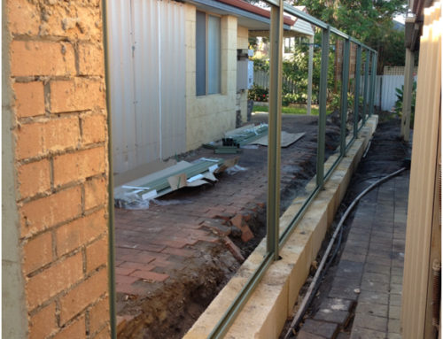 Installing a fence on top of a limestone wall