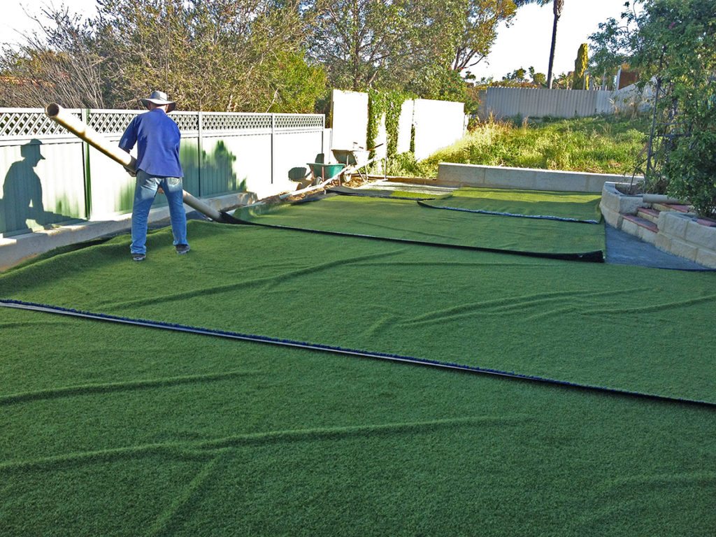 laying the artificial grass