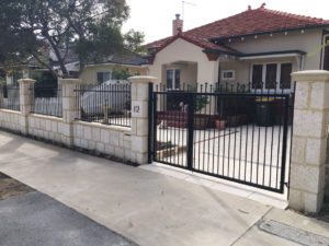 Reconstituted limestone block wall with infills Swanbourne