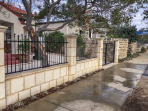 Reconstituted limestone block wall with infills Swanbourne boundary wall