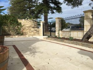 brick paving liquid limestone and limestone block wall