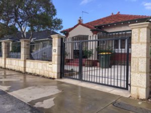 Reconstituted limestone block wall with infills Swanbourne
