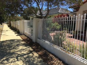 Reconstituted limestone block wall with infills Swanbourne before picture