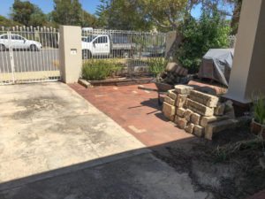 Reconstituted limestone block wall with infills Swanbourne before picture