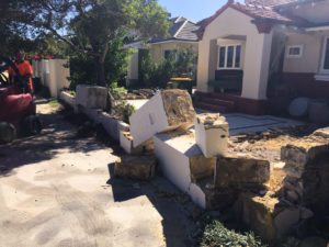 Reconstituted limestone block wall with infills Swanbourne before picture demolition