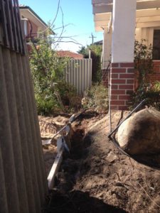 limestone retaining wall colorbond fencing and gates perth