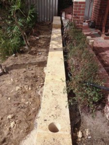 limestone retaining wall colorbond fencing and gates perth
