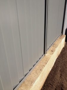 limestone retaining wall colorbond fencing and gates perth