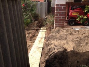 limestone retaining wall colorbond fencing and gates perth