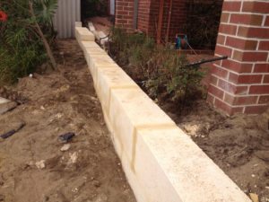 limestone retaining wall colorbond fencing and gates perth